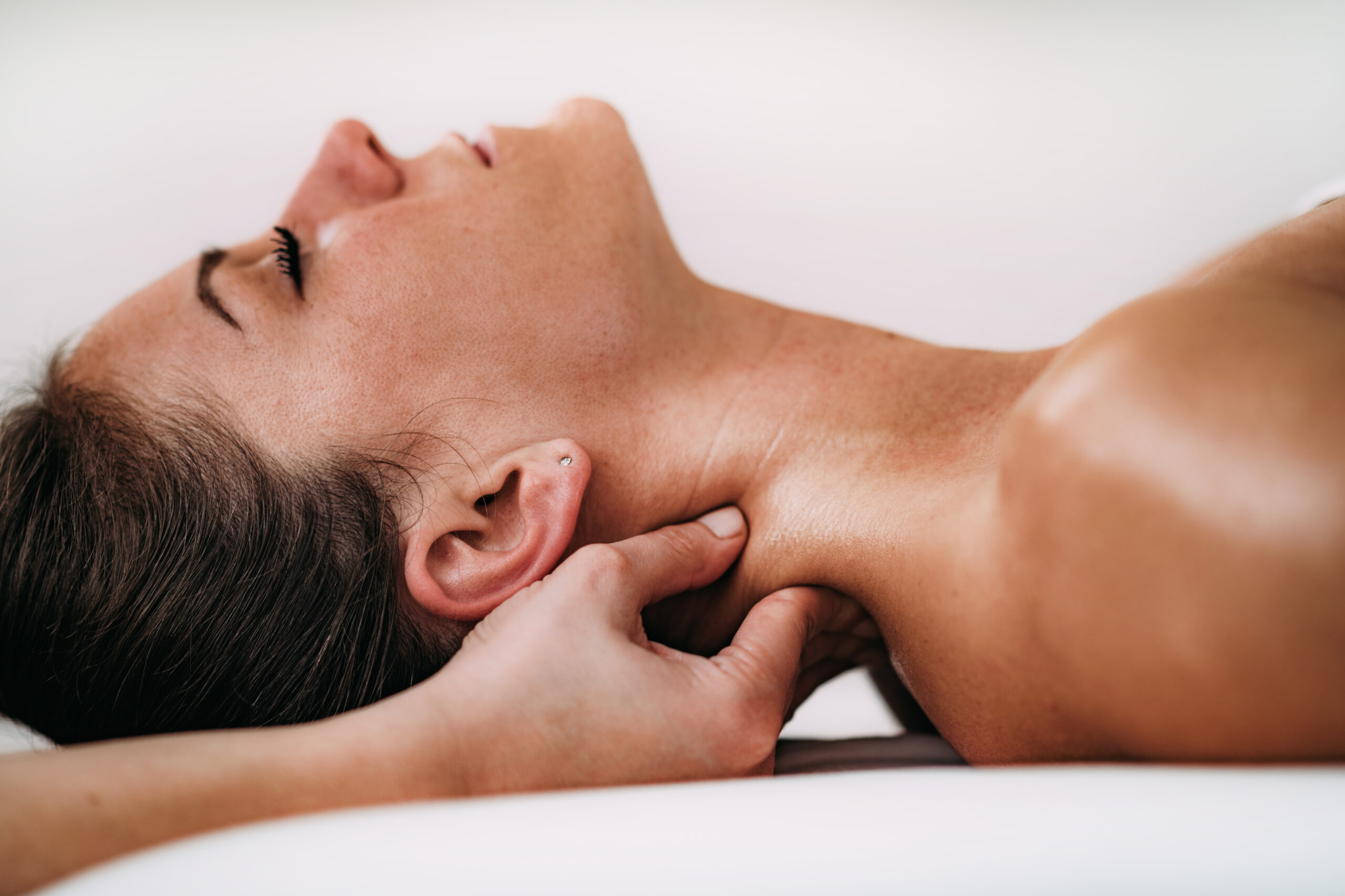 Specialist releasing a pinched nerve with neuromuscular therapy in Colorado Springs CO.
